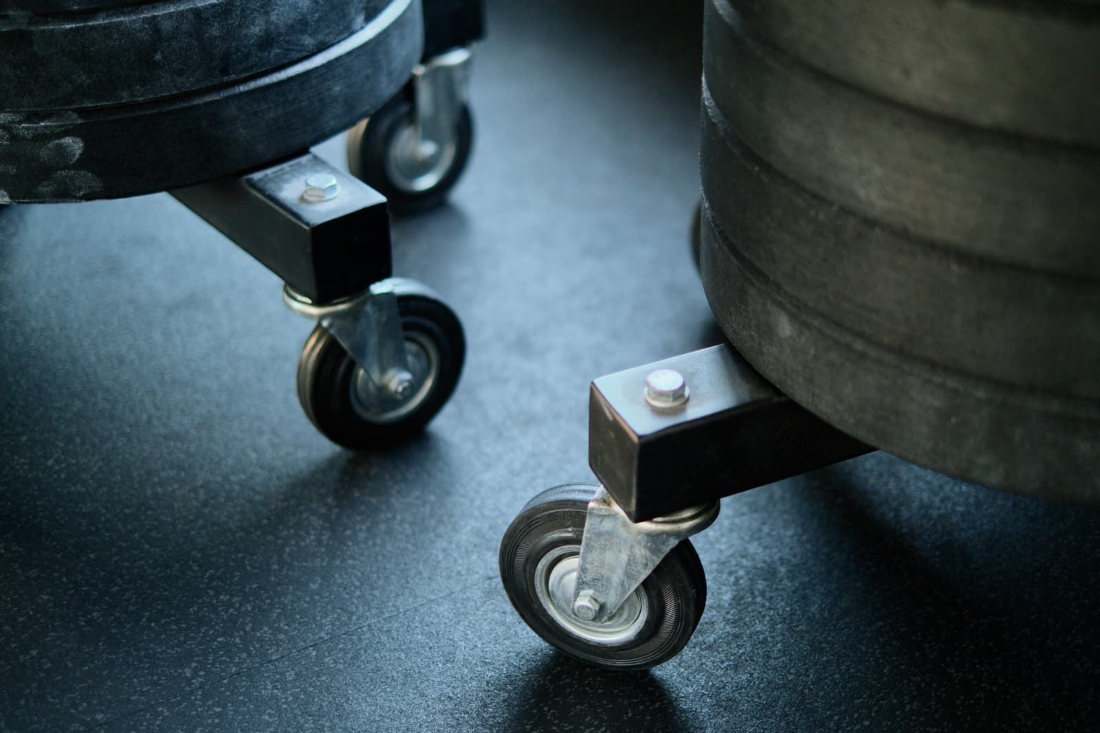Interlocking rubber floor tiles on a concrete slab